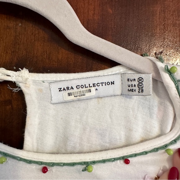 Embroidered white top. - Picture 8 of 8